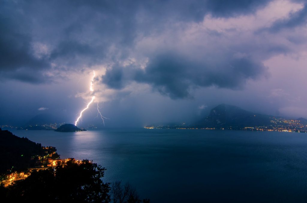 lightning bolt over bellagio on lake como