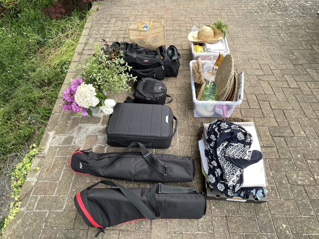 photographic gear and staging props ready to be packed into the car